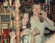 Attractive barmaid & less attractive Phil